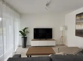 Moderne, helle Wohnung mit großer Terrasse , Bright, modern apartment with large sun terrace