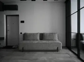 Modern Dark Minimalist Apartment with Panoramic Views