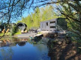 Tinyhouse direkt am See Angeln Ruderboot SUP Spa Sauna und Hot Tub, Hotel in Twist