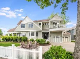 Elegant Estate w/ Modern Amenities Across from Woodman Beach!