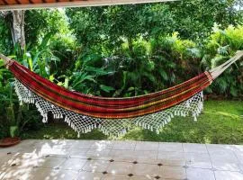 Demi-villa cosy au cœur d un jardin tropicale, proche aéroport