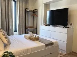 Modern Studio Near IT Park with Pool & Fast WiFi - The Median