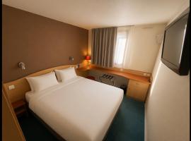 Kyriad Montpellier Aéroport - Parc Expo โรงแรมในมอกิโอ