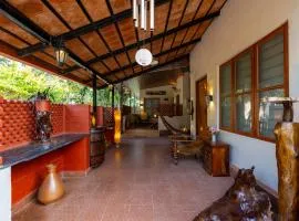 ELIVAAS Twisted Tree Together 2-BHK Villa with Shared Pool, Bar & Restaurant