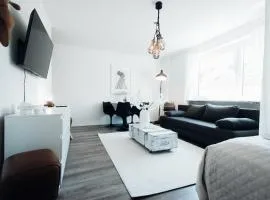 1 BR Studio - ZENTRAL - PARKHAUS - BUSINESS - KAFFEE - NETFLIX - SMART TV - KÜCHE