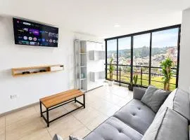 Apartamento amplio frente a Santo Tomás con parqueadero privado y wifi