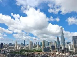 Superb city center view with floor-to-ceiling windows three bedrooms Stunning views of the Bund Shanghai Tower Yu Garden and Peoples Square
