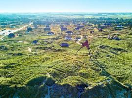 10 person holiday park home in Ulfborg، فندق في Ulfborg