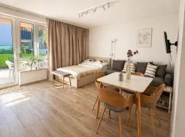 Kawa na Tarasie - Nowoczesny Apartament w Augustowie z Parkingiem