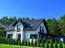 Dom pod lasem Sława-Tarnówek 60