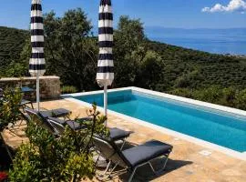 Niki's Tower - Serene Seaview Stone Getaway