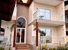 Flat maravilhoso na praia