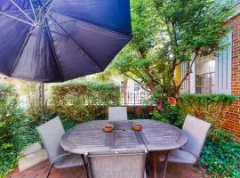 Historic downtown townhome with brick courtyard, sunroom & parking