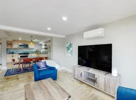 Serene waterfront home with kayaks, paddle board, grill, firepit, WD, and AC