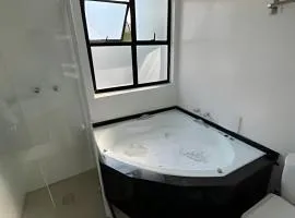 Novíssimo flat 5 min a pé da praia de SV!