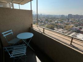 Espacioso y Moderno con vistas a la Ciudad más Parking, hotel en Santiago