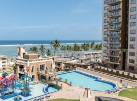 Sandy Shore Beach Apartments - Karibu Quarters, hotel i Kikambala