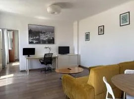 Sunny 1BR near Obor with Garden Patio and Workspace