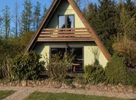 Livias Lodge Nurdachhaus mit Sauna Terrasse und Garten am Wald