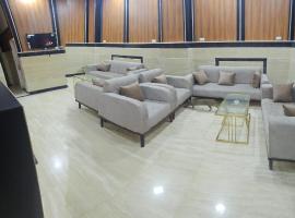 بيوتات, hotel u gradu ‘Izbat Tall Abū Nārūz