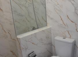 Déjalo ser, hotel u gradu Nueva Helvecia