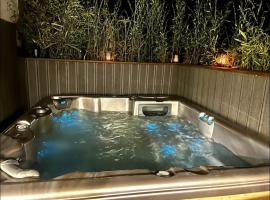 Appartement en bord de lac avec jaccuzi, hotel i Publier