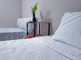 The Palm Suites, Hotel in Llano de Los Patos