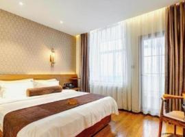 James Joyce Coffetel Qufu Tourist Center Gulou Street Sankong Scenic Spot، فندق في Qufu