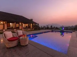 StayVista's Vyoman Villa - Experience a valley view, lush lawn, spa, and yoga retreat