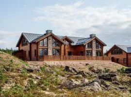 Älgen en fjällstuga med stor altan i sydväst i Idre Bergsby