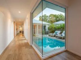 Trinity Beach Coastal Luxe Pool Retreat 4BR