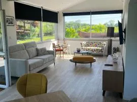 Appartement Rez de jardin pleine nature avec jacuzzi privatif