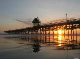 Just Steps to the beach with Ocean & Pier Views