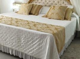 Hotel Lang Palace - Fica no Centro da Cidade، فندق في تشابيكو