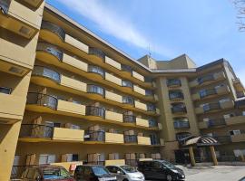 紀州鉄道草津温泉ビラ، فندق في كوساتسو