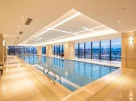 The QUBE Hotel Jingzhou, hotel em Caoshi