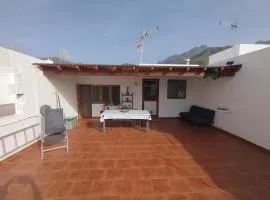 Susa and Pepe garden and house