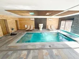Chalet Prestige-Piscine chauffée-Clim-12 pers