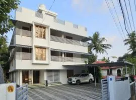 PAZHOOR RESIDENCY HOMESTAY GF 3BHK Deluxe Apartment
