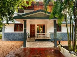 Tranquil Villa by River Peaceful stay by Homeyhuts