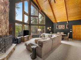 Modern Mountain Chalet with Wall-of-Windows Forest Views.