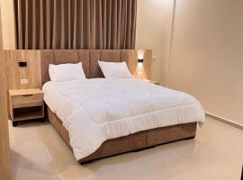 حرملك للشقق الفندقيه、Al Mafraqのホテル