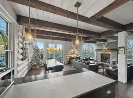 Chalet Inukshuk Luxury Log Cabin with Spa Lake View and Club Access near Mont Tremblant