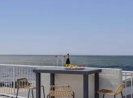 Coastal Comfort with Ocean Views from Shared Rooftop and Separate Pool