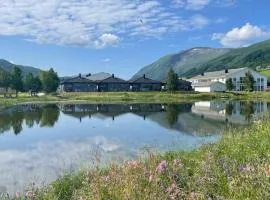 Strandhus i idylliske omgivelser