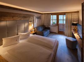 Das alpine Lifestyle Berghotel Madlener, מלון בדאמולס