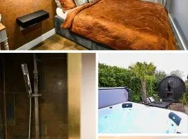 The Hideout - private luxury cabin near the sea with spa, patio area, and parking