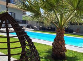 Luana Monte Apartments, отель в Амударе