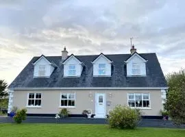 Roskeen house
