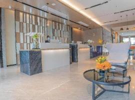 Echarm Hotel Zigong Machishui Wanda Plaza, viešbutis mieste Shuping